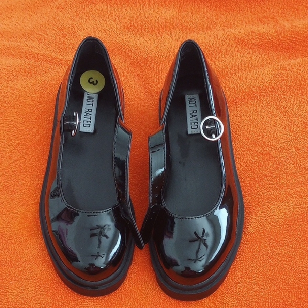 Pair of Black patent leather strap thick soled dress shoes